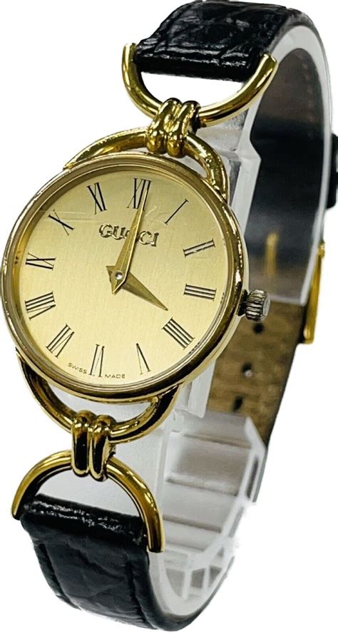 Gucci 6000.2.L Gold Dial Brown Band Quartz Women's Watch.